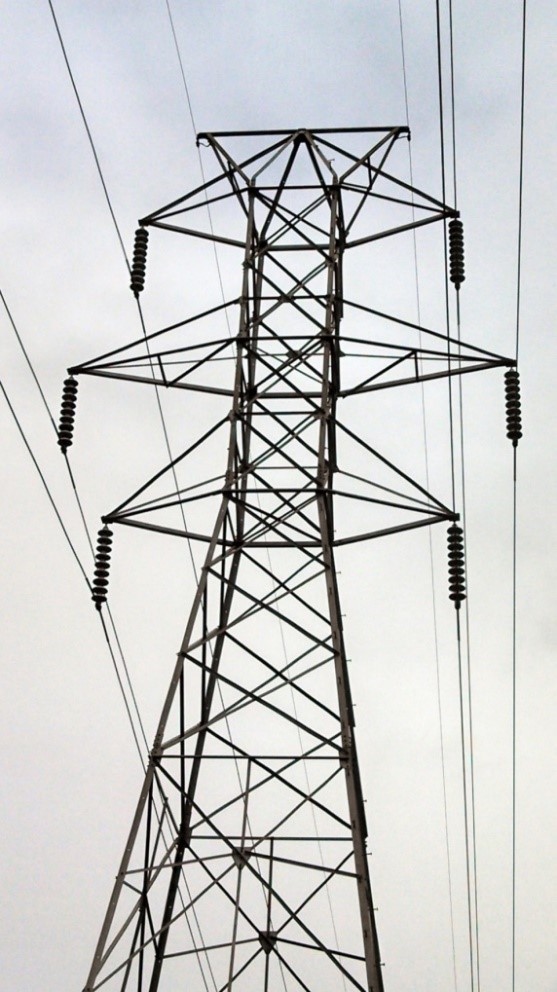 Figure 2. Run along the top of the steel towers, the static ground-wire serves as a type of lightning arrester